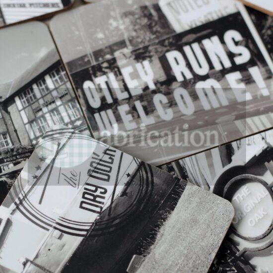 image of black and white pub coasters overlapping