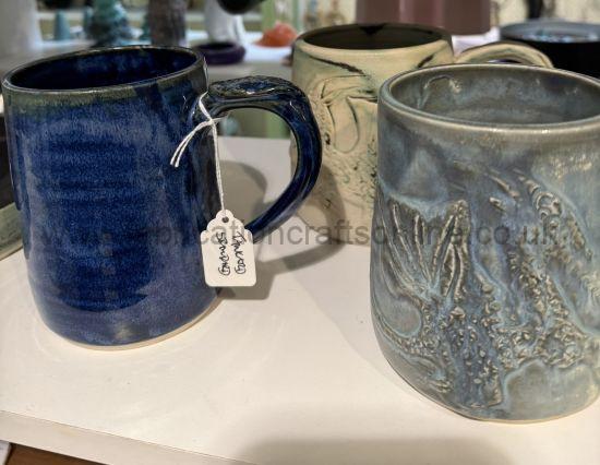 <p style="text-align: left">hand made ceramic tankard plain design or with dragon wraparound vessel cup and saucer single cup or mug from margaret glackin</p>
finished in one of margarets unique glazes
a beautiful gift for any time of the year
dishwasher microwave and oven safe