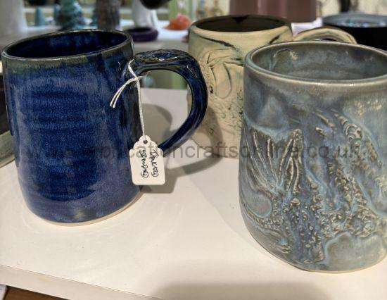alttag drinking vessel <p style="text-align: left;">hand made ceramic tankard plain design or with dragon wraparound vessel cup and saucer single cup or mug from margaret glackin</p>
finished in one of margarets unique glazes
a beautiful gift for any time of the year
dishwasher microwave and oven safe