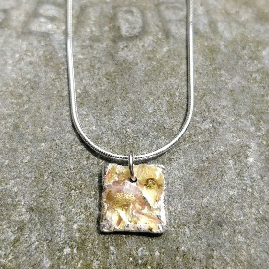 Large gold leaf necklace and earrings