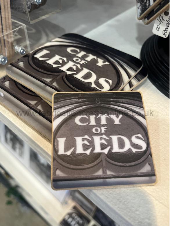 leeds pub keyrings and magnets keyring with black and white photographs of an iconic leeds pub and places