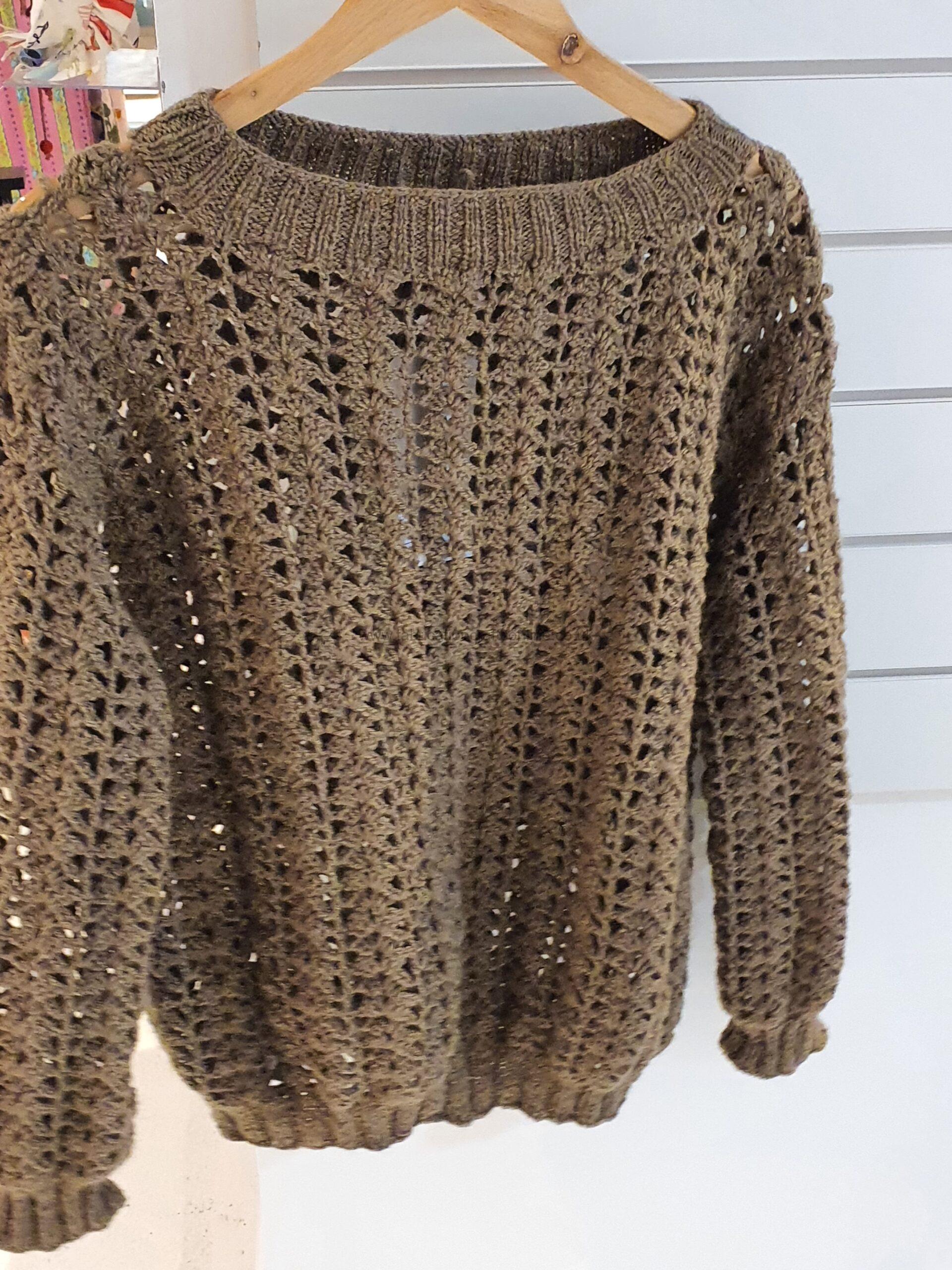 soft puffed petal crochet flowers rest delicately around the wrist to bring a touch of charm and uniqueness to everyday life