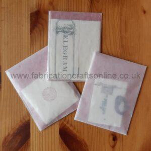Three different types of historically inspired lettersets with red envelopes.