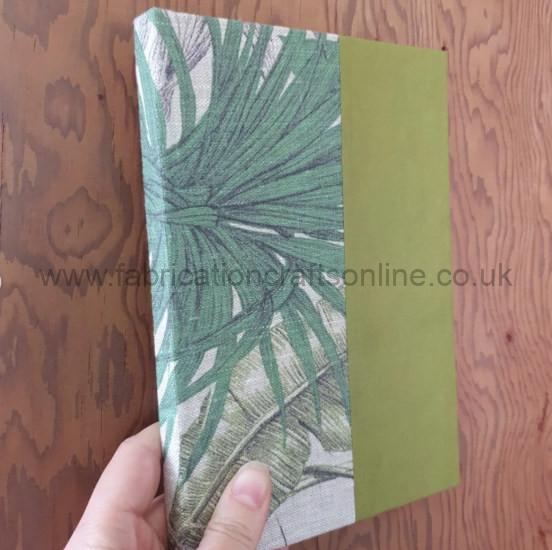 a rebound deadstock notebook with new endpapers and either fabrics rescued from landfill or vintage book cloth and hand marbled paper