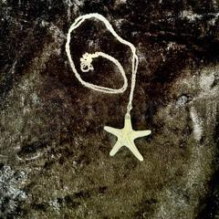 hand cast pewter starfish pendant on an inch sterling silver chain
matching earrings and cufflinks available
