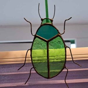 Stained glass Tansy beetle