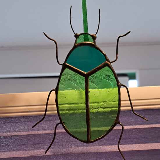 Stained glass Tansy beetle
