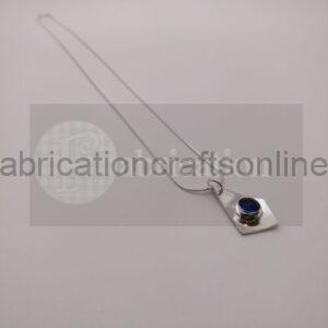 Sea glass bezel set necklace with silver surround