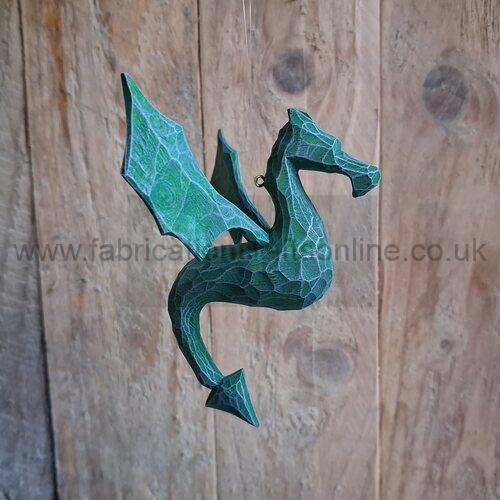 my hanging dragons are carved from lime and finished in a range of colours 