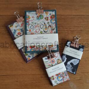 A selection of miniature clipboards of various designs.
