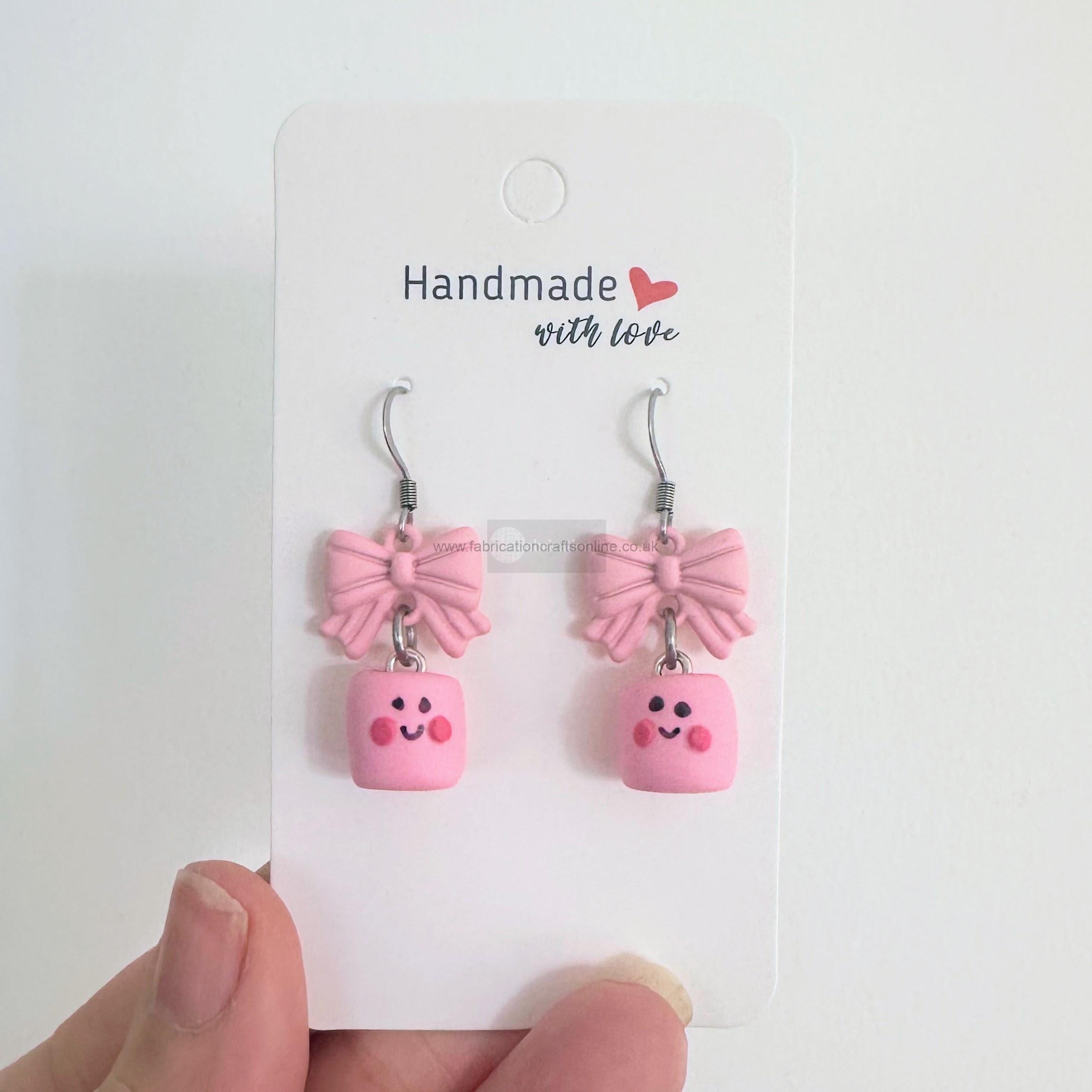 <p style="text-align: center">mac mini dangle earrings</p>
polymer clay earrings with hypoallergenic stainless steel hardware 