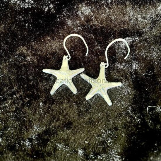 starfish earrings hand thrown ceramic cup and saucer by margaret glackin

oven microwave and dishwasher safe