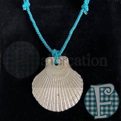 three hand cast pewter medallions on a blue cord with sterling silver connections 