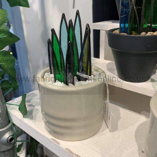 buy in store leeds or click and collect only

small stained glass spiky succulent plant in a dark grey terracotta pot available in a variety of colours gift boxed available if required 