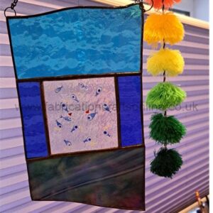 stained glass fish panel