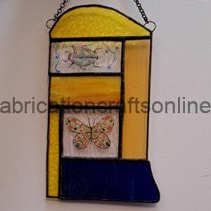 stained glass panel suitable for hanging on a light coloured wall or in a window 
