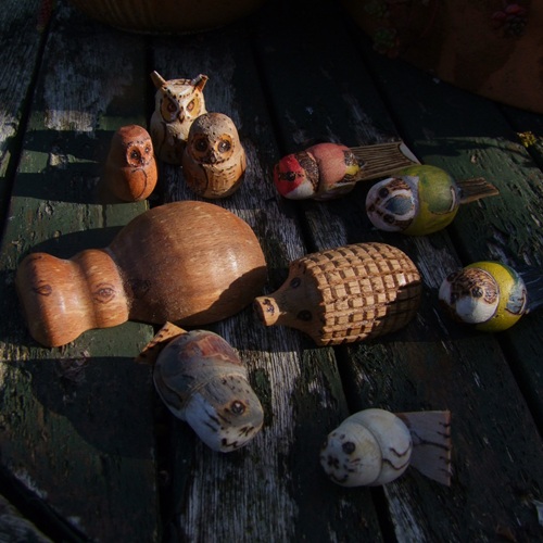 pyrography decorated signs with medieval marginalia 
