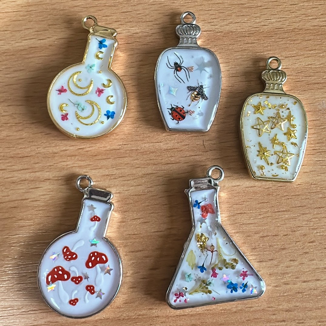 mac resin potion bottle pendant 