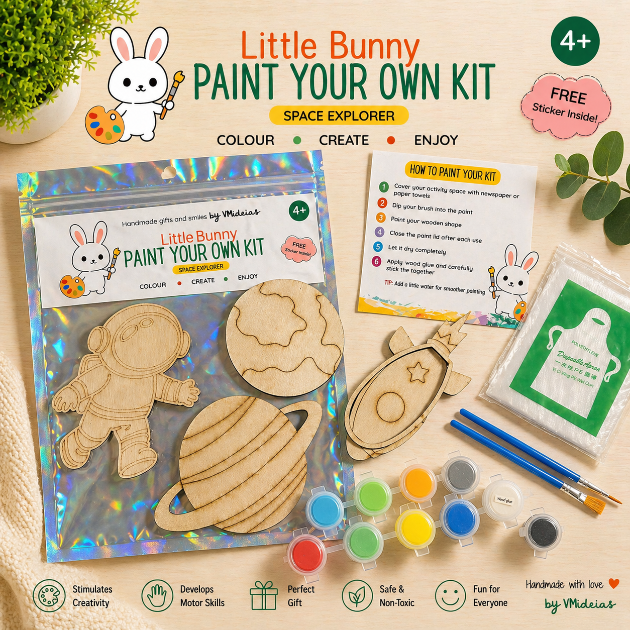Little Bunny Paint Your Own Kit for kids 4+, showing wooden space-themed shapes, paints, and brushes included in a colorful craft set