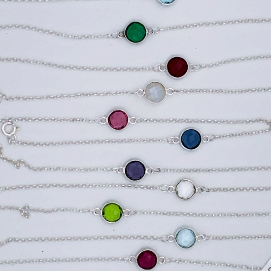 sterling silver birthstone bracelets

delicate sterling silver necklace with a mm faceted gemstone on an  r  chain

delicate sterling silver necklace with a mm faceted gemstone bezel  on an  r  chain

delicate sterling silver bracelet with a mm faceted gemstone link 

birthstones are hydro quartz gemstones

january   garnet february amethyst march aquamarine april crystal may emerald june alexandrite or moonstone july ruby august peridot september sapphire october tourmaline november topaz december blue zircon

  