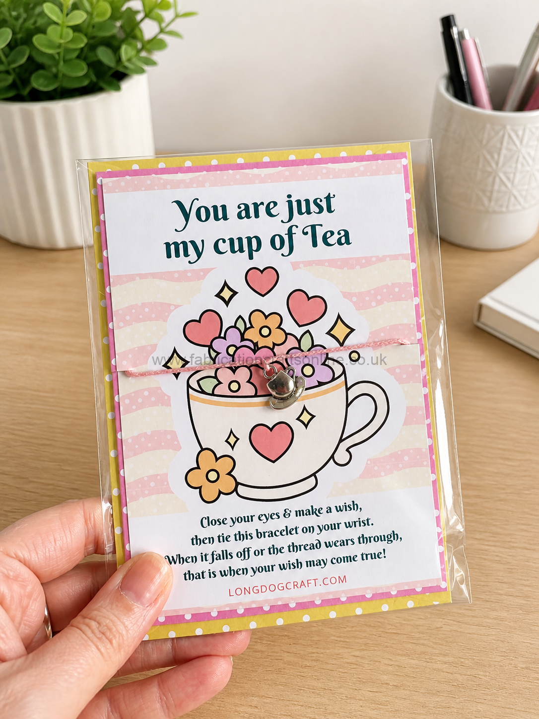 ldc tea wish bracelet with envelope
this product is click and collect only not for shipping
this photo is for a general idea please visit the shop to see the full tea time collection
message reads <span class="a_gcmg font-feature-liga-off font-feature-clig-off font-feature-calt-off text-decoration-none text-strikethrough-none">close your eyes make a wish </span><span class="a_gcmg font-feature-liga-off font-feature-clig-off font-feature-calt-off text-decoration-none text-strikethrough-none">then tie this bracelet on your wrist </span><span class="a_gcmg font-feature-liga-off font-feature-clig-off font-feature-calt-off text-decoration-none text-strikethrough-none">when it falls off or the thread wears through </span><span class="a_gcmg font-feature-liga-off font-feature-clig-off font-feature-calt-off text-decoration-none text-strikethrough-none">that is when your wish may come true</span>
they make the perfect gift for any occasion whether its a birthday anniversary or just to show your love
go on and make someones day with a very special and unique gift
or why not just treat yourself