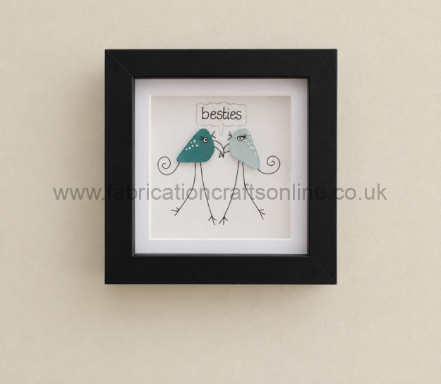 a whimsical handcrafted toadstool made from genuine red sea glass with hand drawn woodland details beautifully presented in a  x  cm shadow box frame