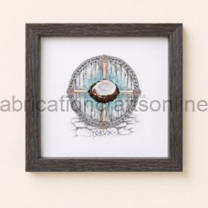 Framed illustration of a circular metal Viking shield with studs and turquoise background, with 'YORVIK' beneath.