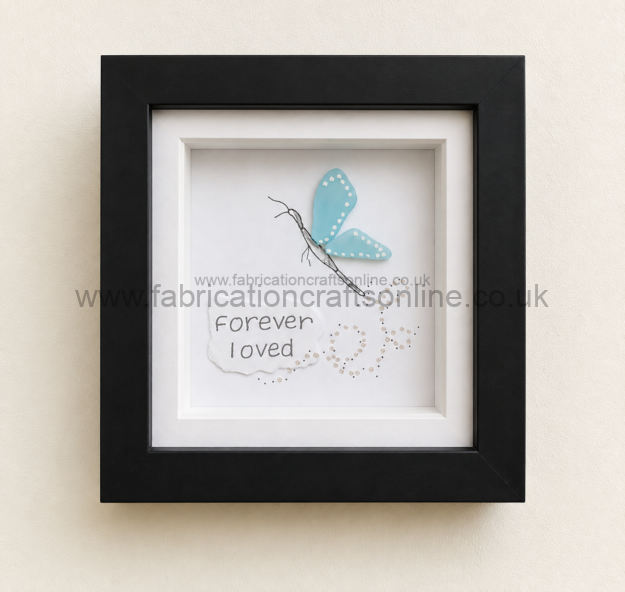 a colourful handcrafted fish created entirely from genuine sea glass and vintage china with silver embellishments beautifully presented in a  x  cm shadow box frame a cheerful piece inspired by the sea