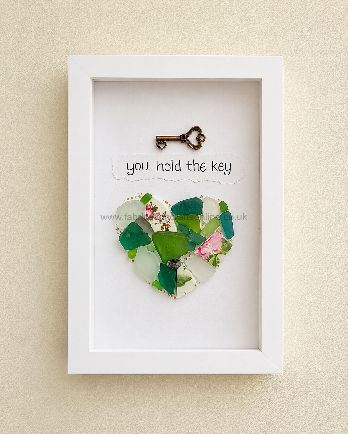 Sea Glass Art Key a handcrafted heart created from genuine sea glass and reclaimed vintage china finished with a vintage style key and the words you hold the key beautifully presented in a x cm white shadow box frame