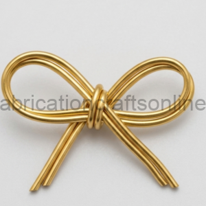 Gold metal wire bow ornament with loops and knot on a white background