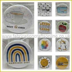 Button badges with themed printed designs