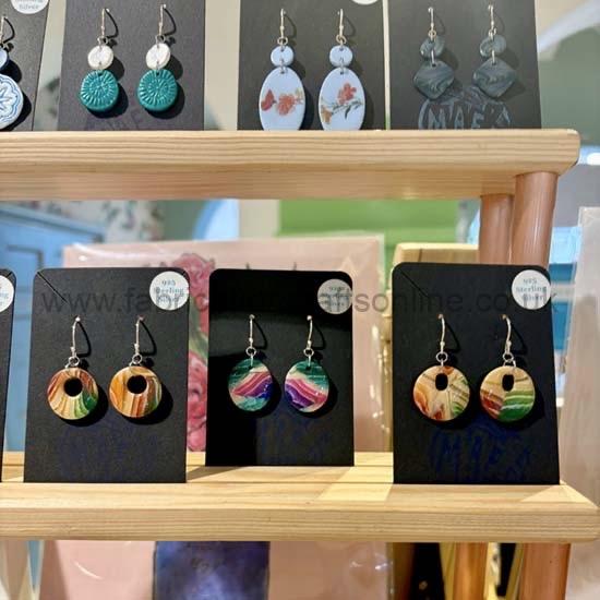 premssear medium available in store only
premium sterling silver polymer clay earrings
handmade using polymer clay with sterling silver ear hooks
all shapes are organic and handmade so no two are exactly the same each pair are truly unique these earrings are sisters not twins
designed shaped baked and assembled with lots of care at my home office just outside york
made with sterling silver findings
care tips
store in a clean dry place do not wear in water
treat these earrings gently just as you would any other piece of jewellery