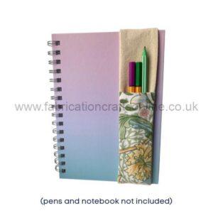 Notebook with gradient purple-to-teal cover and a fabric pen holder attached on the right side, containing pencils and a beige cloth inside (pens and notebook not included).