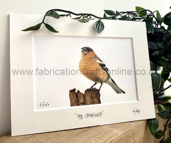 the chaffinch miniature handmade books turned into charms earrings brooches and necklaces
