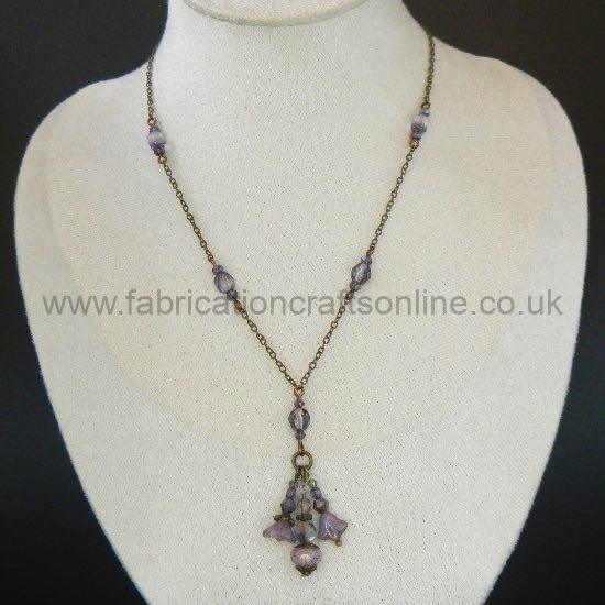 cluster pendant necklace in lilac purple teardrop frame pendant necklace made with glass beads and antique bronze findings