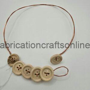 Copper wire collar with wooden buttons