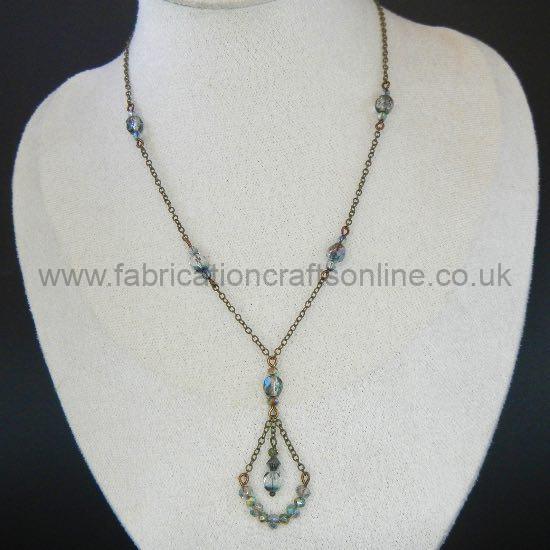 teardrop frame pendant necklace in pale green teardrop frame pendant necklace made with glass beads and antique bronze findings